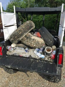 Trash and Tires in back of truck