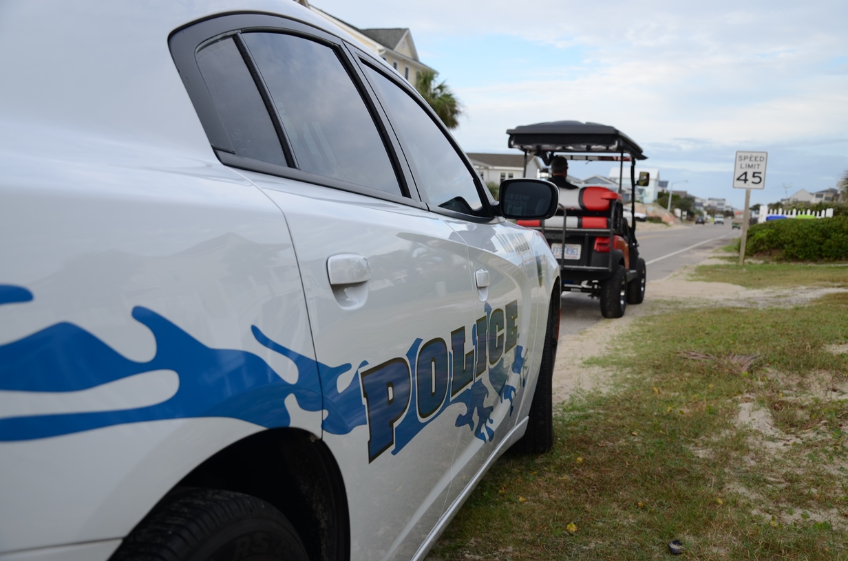 Golf Cart stopped by a police car