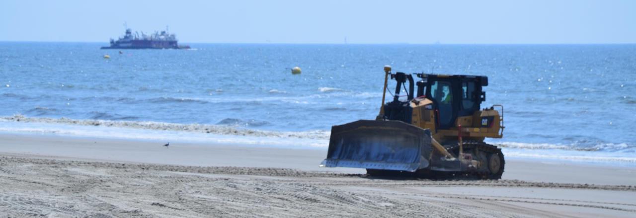 Beach Nourishment Bulldozer on the Beach